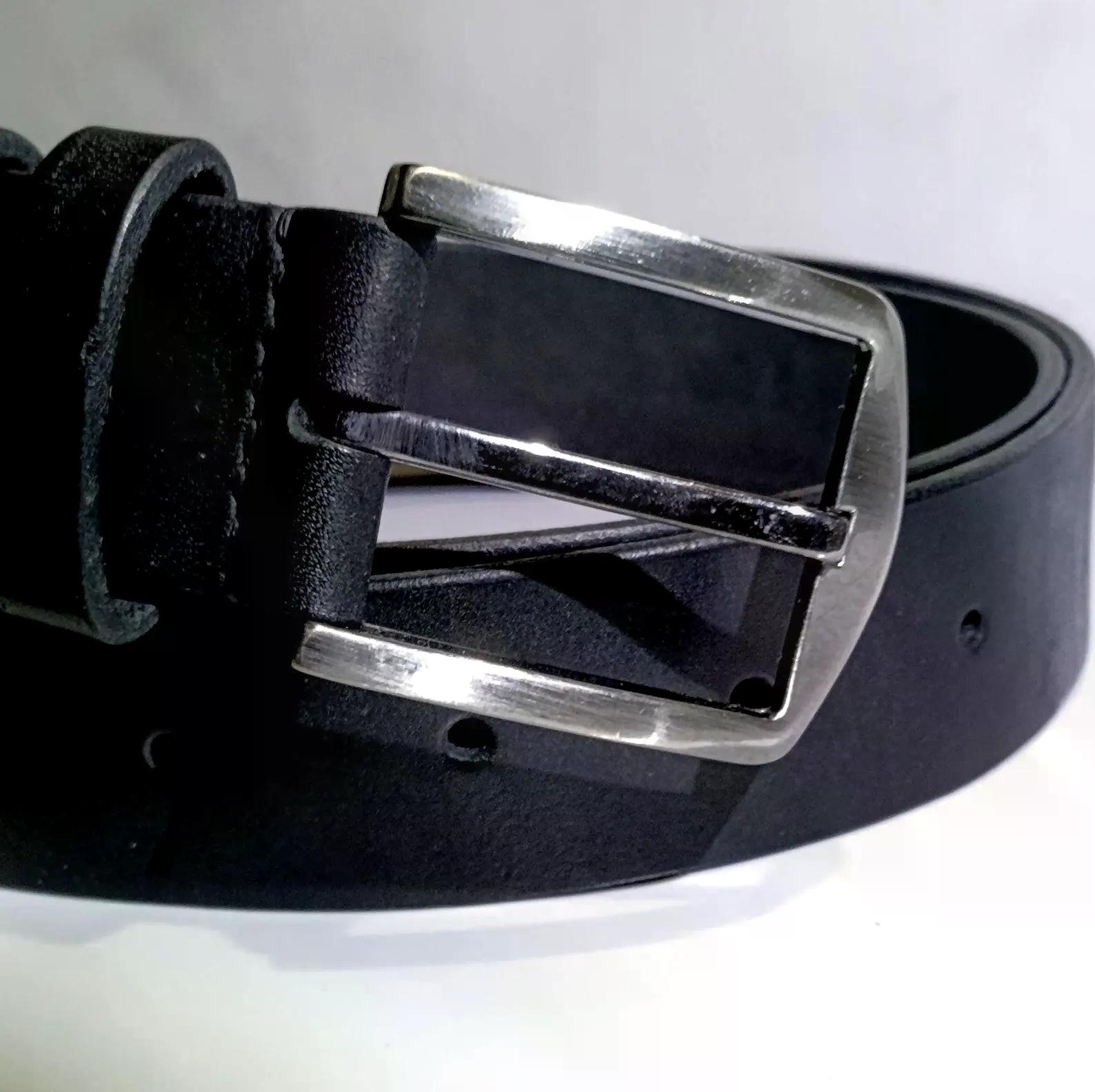 Handmade black leather belt with a minimalist rectangular metal buckle