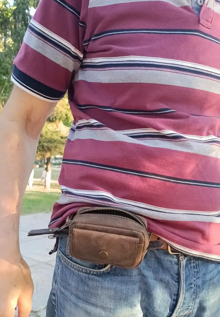 Handmade  leather EDC pouch displayed with keys, cards and everyday carry accessories